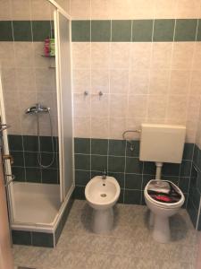 Kúpeľňa v ubytovaní Apartman Ylli