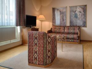 Posezení v ubytování Posthaus Hotel Residenz