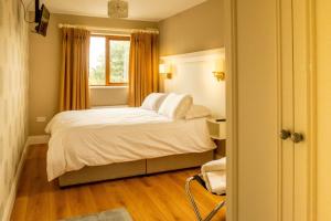 Cama o camas de una habitación en Jacob's Well Hotel