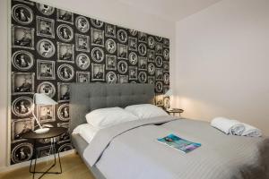 Posteľ alebo postele v izbe v ubytovaní Boogie Apartments