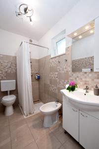 Ένα μπάνιο στο Apartment Mediteraneo +31 φωτογραφίες