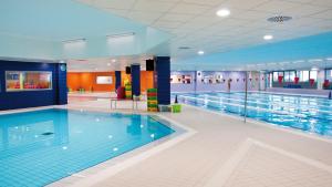 Bazén v ubytování Ambruosi Village Resort & SPA nebo v jeho okolí