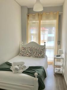 Posteľ alebo postele v izbe v ubytovaní Mirandesa Guesthouse