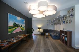 Postel nebo postele na pokoji v ubytování Hotel Restaurant Tychon AG