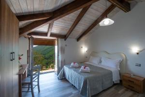 A bed or beds in a room at Il Casale del Contadino