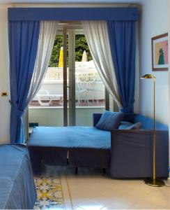 Łóżko lub łóżka w pokoju w obiekcie Hotel Continental
