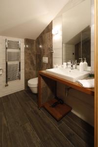 Koupelna v ubytování Hotel Passpartù Home Garni