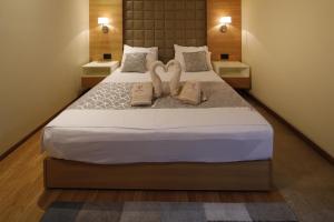 Postel nebo postele na pokoji v ubytování Hotel Passpartù Home Garni