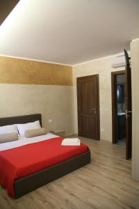 Postel nebo postele na pokoji v ubytování Red Lion Guest House