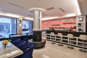 Posezení v ubytování Harmonious Hotel