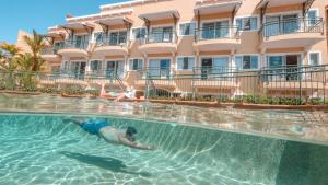 Photo de la galerie de l'établissement Il Palazzo Holiday Apartments, à Cairns