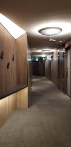 an empty hallway in a office building with a ceiling at New California in Xindian