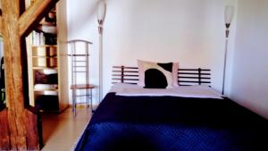 Ein Bett oder Betten in einem Zimmer der Unterkunft Apartment Regensburg
