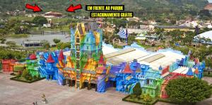 an image of an amusement park with the words go faster than an airplane at Hotel Panorâmico in Penha