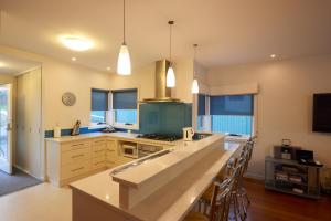 A kitchen or kitchenette at Bridport Holiday Rental