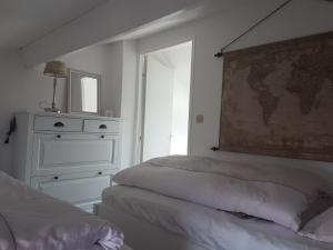 Postel nebo postele na pokoji v ubytování Maison Princesse