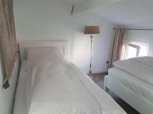 Postel nebo postele na pokoji v ubytování Maison Princesse