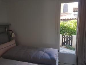 Postel nebo postele na pokoji v ubytování Maison Princesse