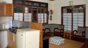 Kuchyň nebo kuchyňský kout v ubytování Villa Kota Bunga Ade Type Jepang - 0224