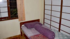 Postel nebo postele na pokoji v ubytování Villa Kota Bunga Ade Type Jepang - 0224