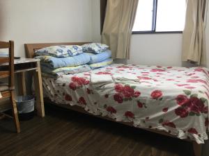 Säng eller sängar i ett rum på Lucky Hostel