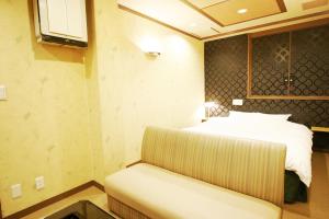 Letto o letti in una camera di Hotel Mio (Adult Only)