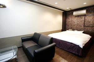 Letto o letti in una camera di Hotel Mio (Adult Only)