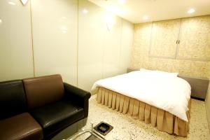 Letto o letti in una camera di Hotel Mio (Adult Only)