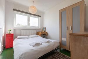 Un ou plusieurs lits dans un hébergement de l'établissement 1 Bedroom Flat in King's Cross