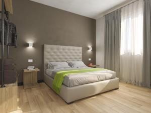 Кровать или кровати в номере Hotel Doria