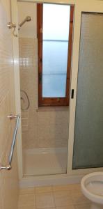 Kupatilo u objektu Residence Baia Blu Falcone