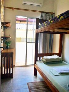 Cama ou camas em um quarto em Zen Hotel Brasil