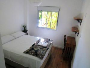 Cama ou camas em um quarto em Zen Hotel Brasil