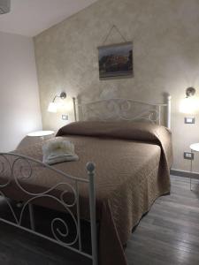 Posteľ alebo postele v izbe v ubytovaní B&B Magna Graecia