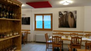 Reštaurácia alebo iné gastronomické zariadenie v ubytovaní Agriturismo da Ysy