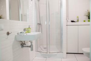 Et badeværelse på MSapartamenty Centrum 2 + 18 billeder