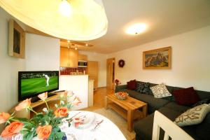 Telewizja i/lub zestaw kina domowego w obiekcie Apartment Haus Schatz