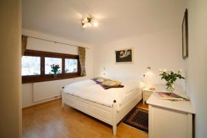 Łóżko lub łóżka w pokoju w obiekcie Apartment Haus Schatz