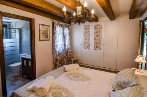 A bed or beds in a room at Borda Fuertes