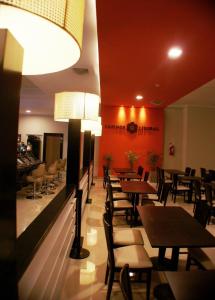
Un restaurant u otro lugar para comer en Condado Hotel Casino Paso de la Patria
