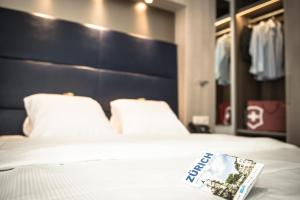 Posteľ alebo postele v izbe v ubytovaní Hotel Alexander Zurich Old Town
