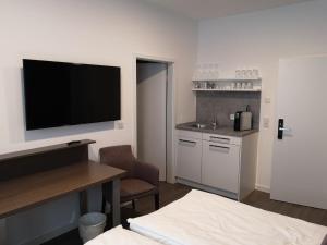 Cuina o zona de cuina de Trip Inn PostApart Aschaffenburg