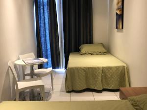 Llit o llits en una habitació de Harbour Lodge