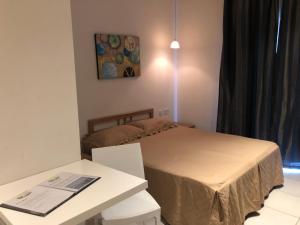 Llit o llits en una habitació de Harbour Lodge