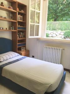 Postel nebo postele na pokoji v ubytování b&b le magnolie