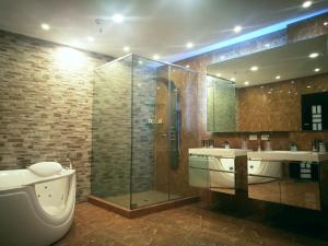 Phòng tắm tại Hotel Ojos Del Rio