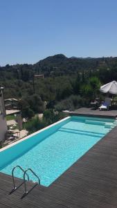 a large swimming pool on top of a house at Place in the Sun in Gouvia