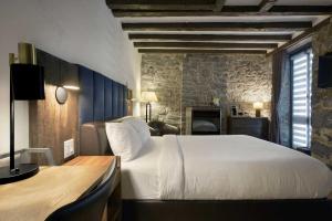 Postel nebo postele na pokoji v ubytování Hotel Épik Montréal
