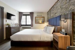 Postel nebo postele na pokoji v ubytování Hotel Épik Montréal