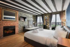 Postel nebo postele na pokoji v ubytování Hotel Épik Montréal